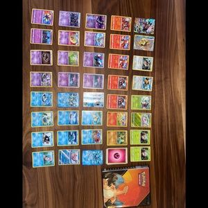 40 Pokémon cards with energies